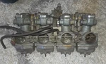 1975 Honda CB550 Four Keihin 022A Carburetor Rack Assembly Oem Parts Rebuild. Fixed Price $195.00.