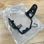 Yamaha Oem Nos Headlight Mounting Bracket / 17T-23174-00-00 XT200 XT125. Fixed Price $60.00.