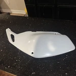 2006-2007 KLX250 Kawasaki Left Side Panel 36001-0078-266. Fixed Price $150.00.