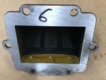 Kawasaki KX125 Reed Valve Block Fits 1982-83 Used Oe Item P/n 12021-1014. Fixed Price $40.00.