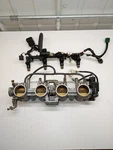 2004 Suzuki Oem Throttle Bodies Fuel Injector Rail. Fixed Price $179.00.