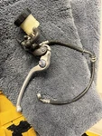 Suzuki 2014 Nissin Front Brake Lever Switch Assembly. Fixed Price $100.00.