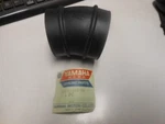 Nos Yamaha Air Cleaner Joint 76 YZ400/IT400 75 MX400 510-14453-00. Fixed Price $137.48.