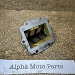 Kawasaki KX125 Reed Valve Cage Basket 1989. Fixed Price $22.00.
