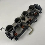 Suzuki 2004 Throttle Body Intake Manifold 13405-29G01. Fixed Price $321.75.