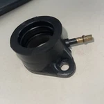 Kawasaki Carb Holder, Right 16065-047. Fixed Price $14.00.