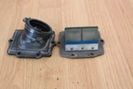 1991 Kawasaki KDX250 Reed Valve Assembly/with Manifold. Fixed Price $59.00.